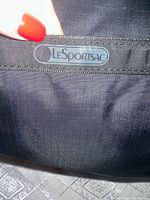 LeSportsac logo on bag exterior