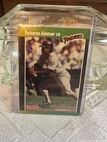 Front of 1989 Donruss #246 Roberto Alomar rookie card in holder