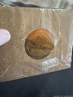 Obverse of coin showing Scott Niedermayer portrait