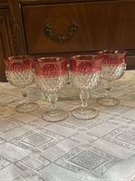 Four cranberry flash diamond point goblets group view