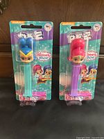 Front view of two sealed Shimmer and Shine PEZ dispensers
