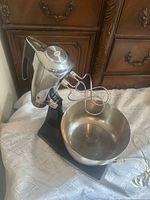 Mixer assembled on stand with one bowl and dough hooks attached