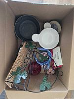 Top view of all items inside the cardboard box