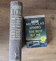 Spine view of Four Past Midnight and front cover of The Best of Me