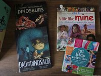 Front covers of four children’s books