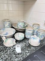 Group shot showing all stoneware pieces together on countertop