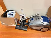 Canister vacuum with hose, wand, floor head and box of bags