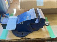 Left side view showing full vise, base, and jaw size