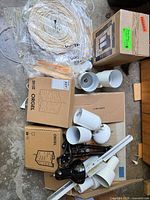 Overview of all lighting items including boxed Orgel shades, Canarm lantern box, desk lamp, track rail and heads