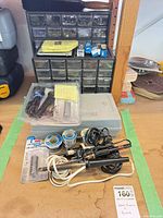 Entire lot showing soldering irons, solder spools, parts organizer, cases