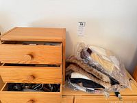 overall view of jewellery box with drawers open and bagged fur collar