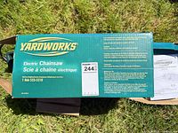 Branded box showing Yardworks electric chainsaw model information