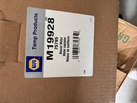 Box label showing NAPA Temp Products, part numbers M19928 / 75795, Blower Motor