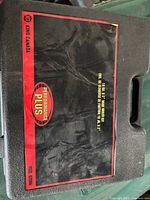 Closed carrying case displaying King Canada Performance Plus branding