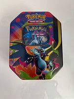 Top view of Pokémon Charizard tin closed