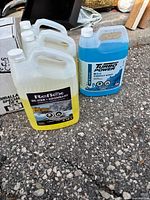 Three Reflex de-icer jugs and one Turbo Power jug