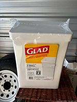 Front view of sealed Glad X-Small 4 gallon garbage bags pack