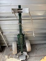 Green Tour Rider pull cart with wheels folded