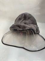 Grey faux-fleece bucket hat with attached clear visor