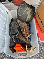 Overview of all hunting gear items inside clear tote
