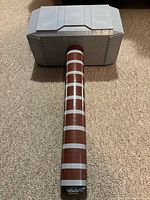 Front view of assembled Lego Thor's Hammer showing handle length and head