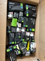 Box containing numerous Noma LED bulb boxes