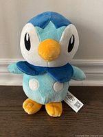 Front view of Piplup plush showing overall appearance