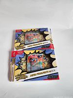 Two opened Pokemon Ascended Heroes Mega Feraligatr EX boxes showing front packaging and visible oversized card