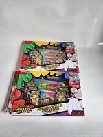 Two Ascended Heroes Premium Poster Collection boxes with window showing folded posters and Gardevoir artwork
