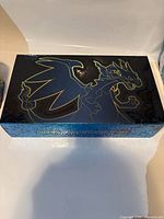 Closed Mega Charizard X box exterior