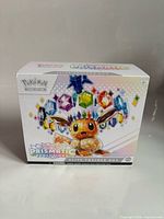Front of Pokémon Prismatic Evolutions Elite Trainer Box