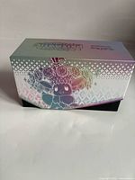 Closed Prismatic Evolutions Elite Trainer Box showing exterior artwork