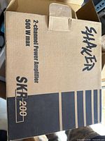 Closed box showing model and specs