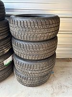 Stack of four matching winter tires