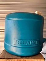 Side view showing Reliance logo and overall condition