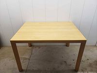 Top view of light wood rectangular table
