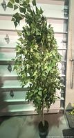 Full view of artificial birch tree showing height and foliage