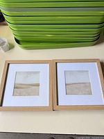 Both framed prints side by side showing front view