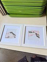 Both framed prints side by side showing overall appearance