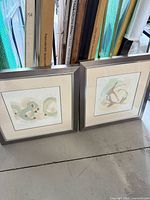 Both framed abstracts side by side for scale, right piece is lot item