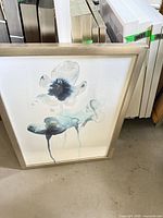 Full view of framed watercolour blossom art