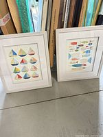 both framed prints standing side by side showing scale and frames