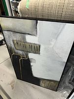 Full view of framed abstract canvas