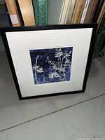 Front view of framed indigo botanical art print