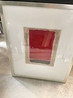 Front view of framed abstract artwork