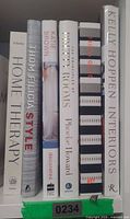 Spine view of all six hardcover design books