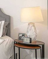 Lamp on bedside table