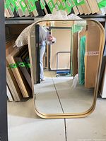 Front view of the rectangular mirror showing full frame and reflection