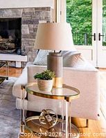 Lamp staged beside sofa showing color contrast and size