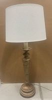 Full view of one lamp with shade